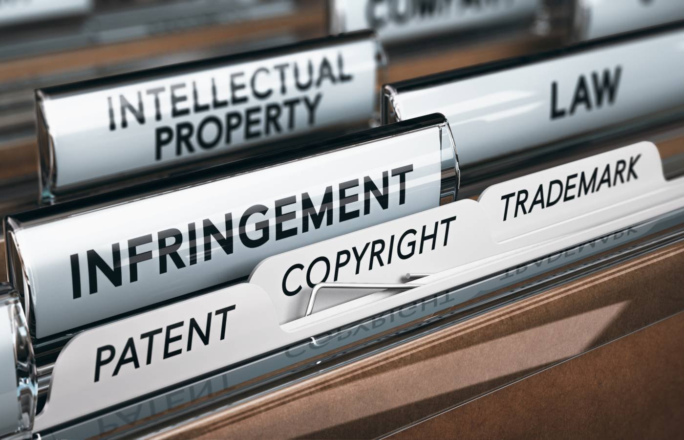 Intellectual property file folders representing patent and infringement work